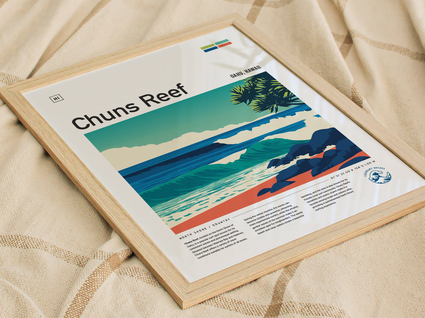 A framed poster titled Chuns Reef features a vibrant illustration of rolling ocean waves against a picturesque beach scene, with lush greenery in the foreground and a clear blue sky above.