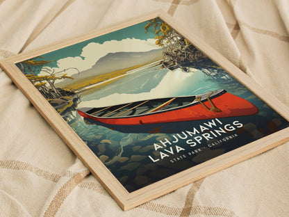 A framed poster of Ahjumawi Lava Springs features a red canoe on calm waters, surrounded by trees and mountains. The text reads Ahjumawi Lava Springs State Park, California.
