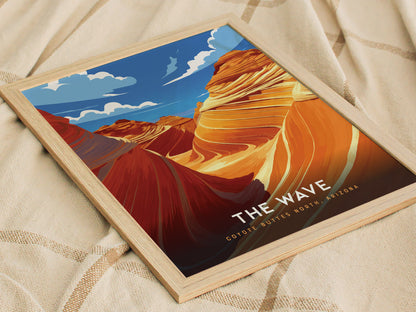 Framed poster of The Wave in Coyote Buttes, Arizona, showcasing swirling sandstone formations in vibrant desert colors, lying on a textured fabric surface.