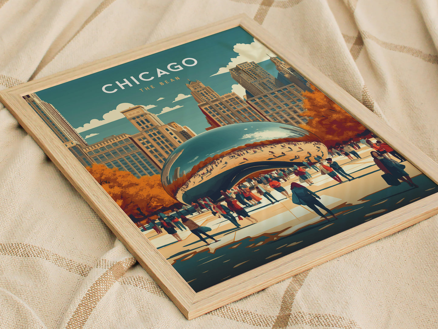 A framed poster featuring an artistic depiction of Chicagos Cloud Gate sculpture, surrounded by people and autumn trees, with a city skyline in the background.