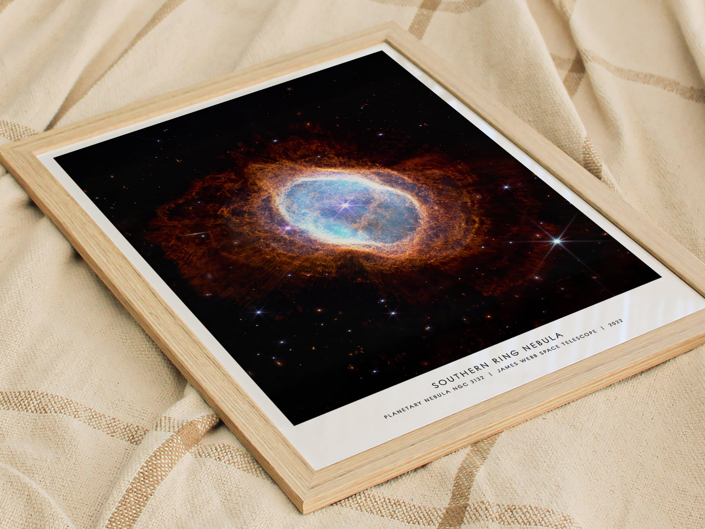 Southern Ring Nebula planetary nebula wall art used as astronomy themed decor in a home office or creative studio