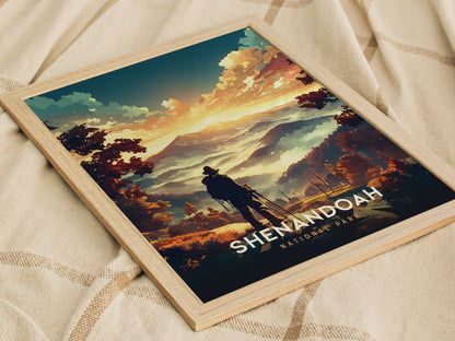 A framed poster depicting a vibrant landscape of Shenandoah National Park with a silhouetted figure overlooking rolling mountains and colorful skies at sunset. The poster rests on a textured fabric.
