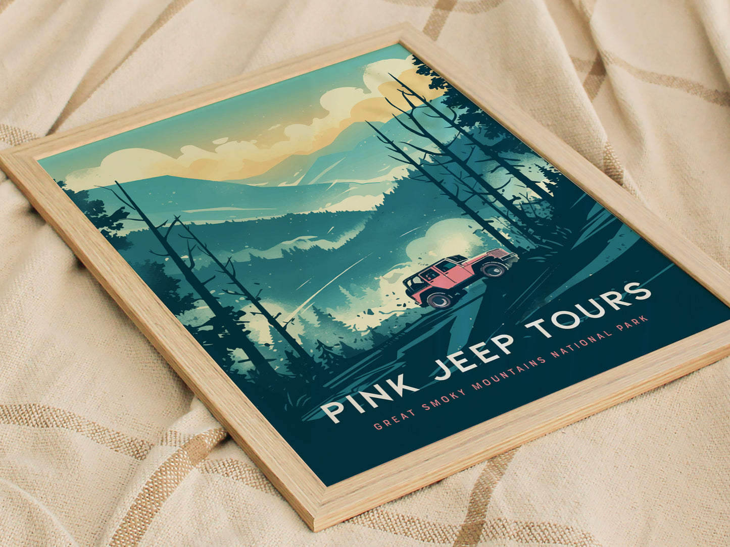 A framed poster depicts a vibrant pink jeep on rugged trails amidst the misty landscapes of the Great Smoky Mountains National Park. The artwork conveys a sense of adventure and off-road exploration.