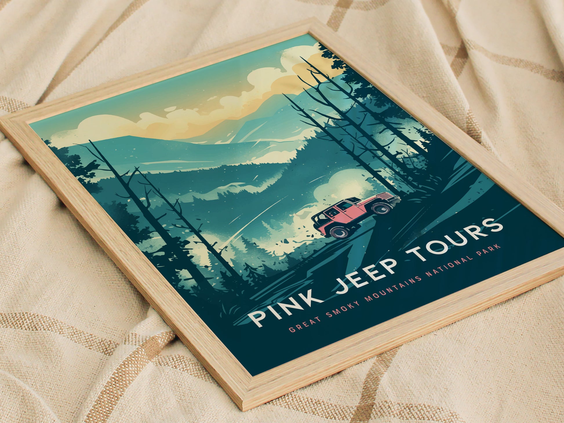 A framed poster depicts a vibrant pink jeep on rugged trails amidst the misty landscapes of the Great Smoky Mountains National Park. The artwork conveys a sense of adventure and off-road exploration.