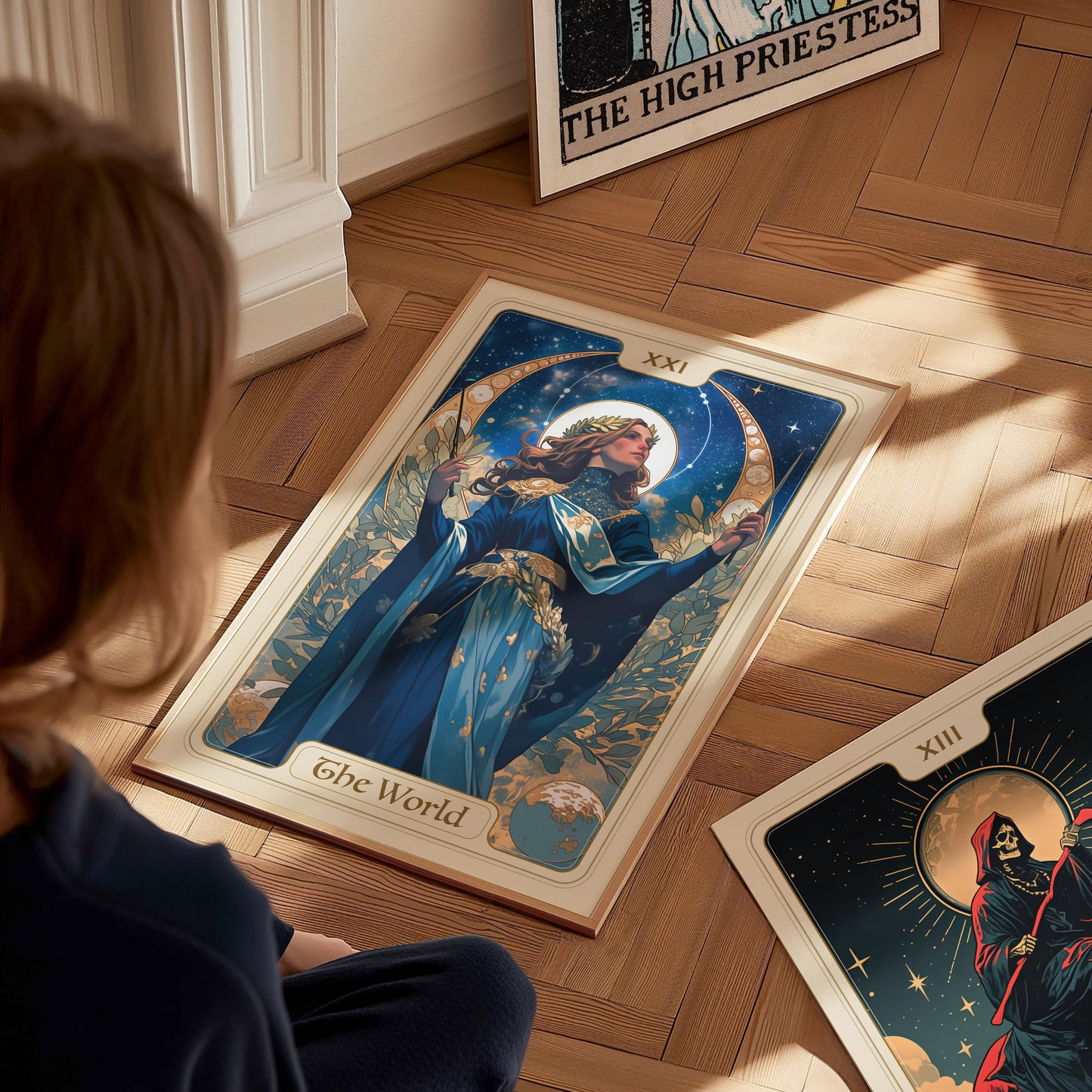 Home setting displaying framed and unframed wall art posters of a crowned figure amidst arches and a starry night sky.