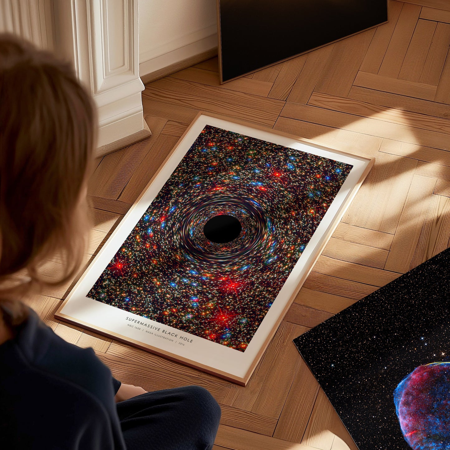 Supermassive Black Hole Poster | NASA NGC 1600 Space Photography Wall Art — styled in a modern interior