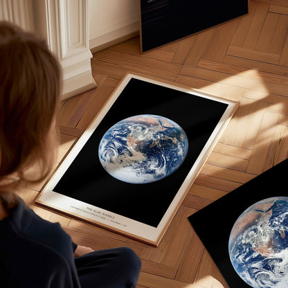 Detail of caption text on Blue Marble poster referencing Apollo 17 and the 1972 whole Earth photograph