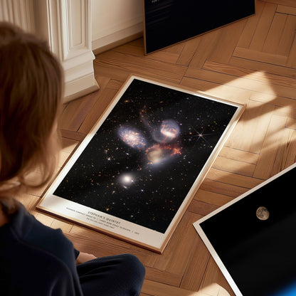 Large Stephan's Quintet James Webb poster displayed in a classroom beside STEM and astronomy posters