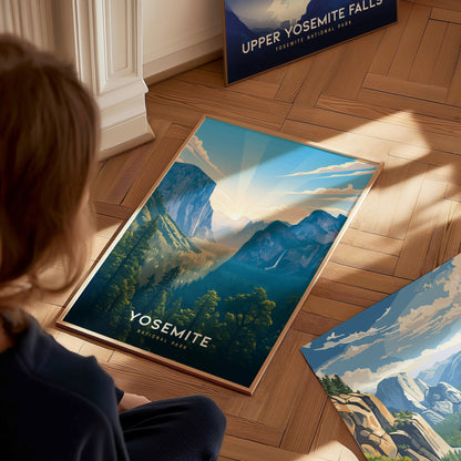 Person looking at Yosemite National Park posters on a wooden floor