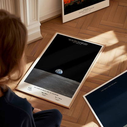 Large Apollo 11 Earth on the Horizon poster displayed in a classroom beside STEM and space exploration posters