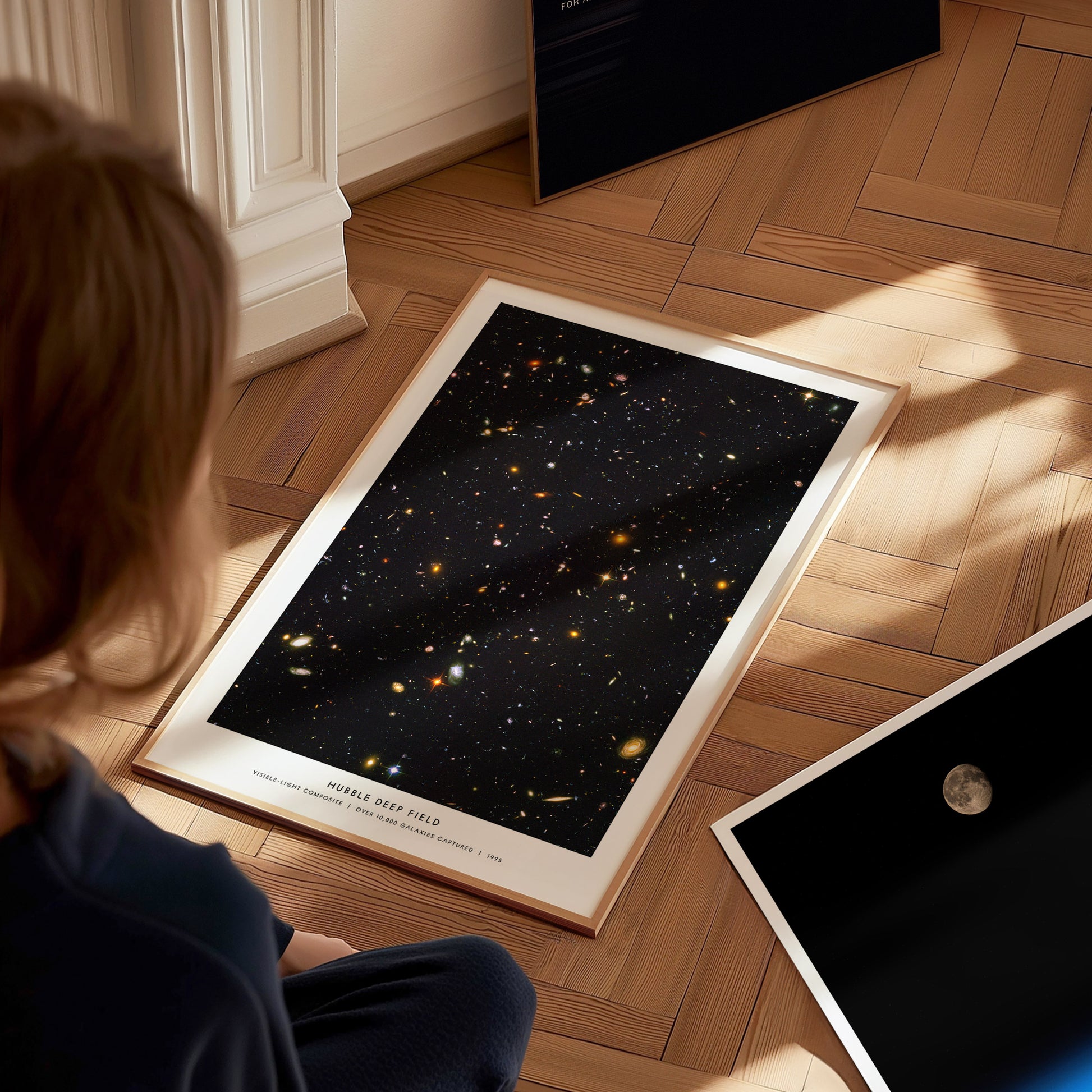 Large Hubble Deep Field poster displayed in a living room