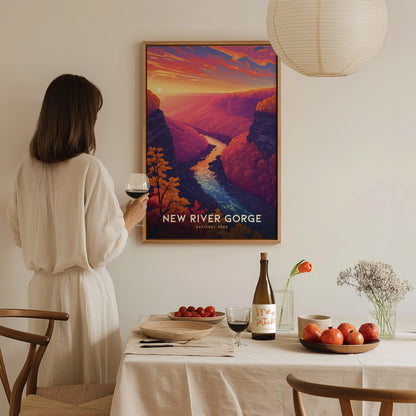 A woman in a white dress admires a colorful New River Gorge poster on a wall. A table with wine, apples, and flowers is in the foreground, creating a cozy.