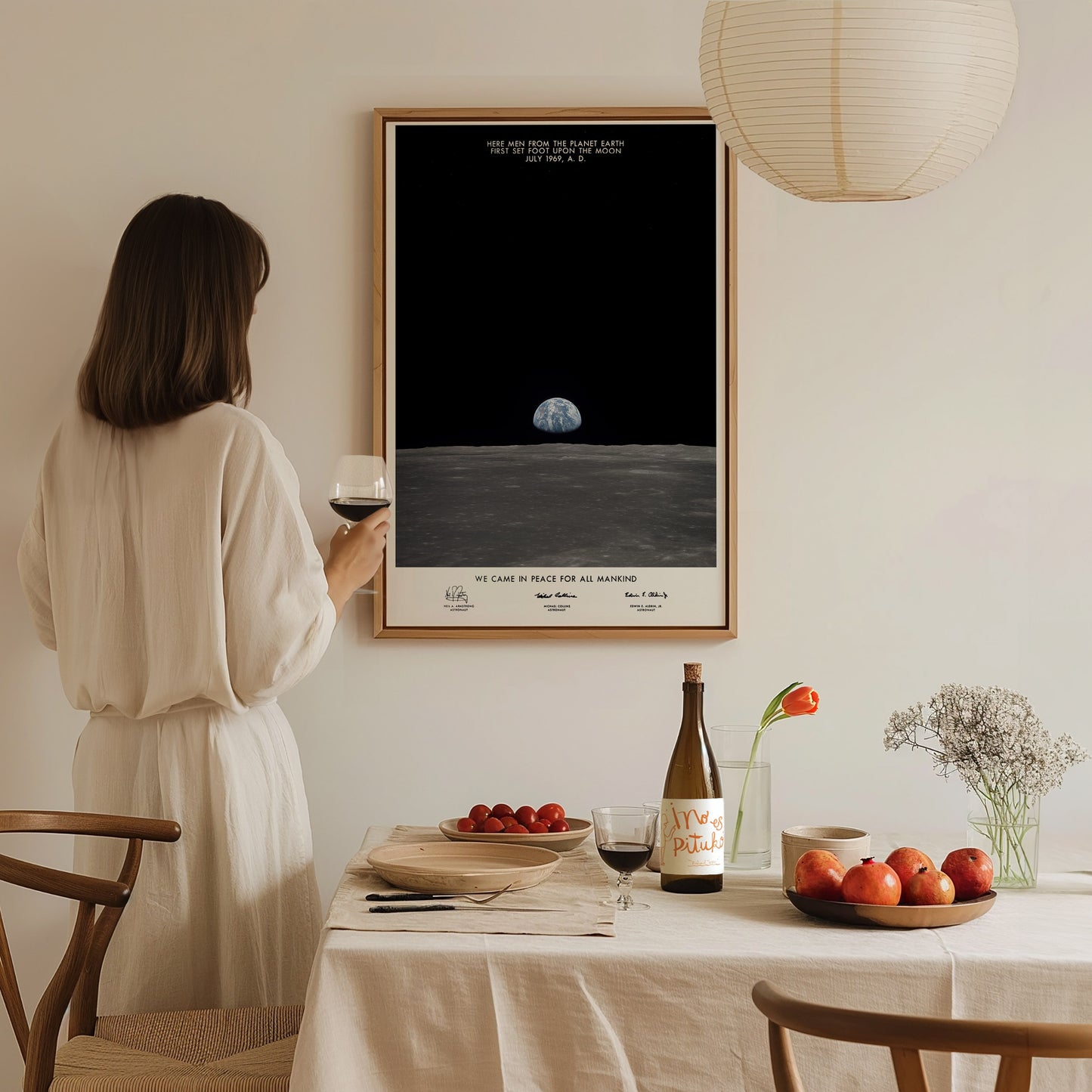 Apollo 11 Earth on the Horizon poster in a floating frame canvas displayed on a clean white wall