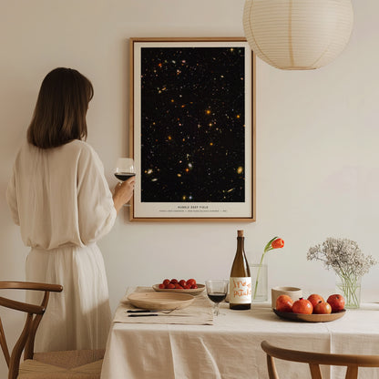 Hubble Deep Field galaxy poster in a floating frame canvas displayed on a clean white wall