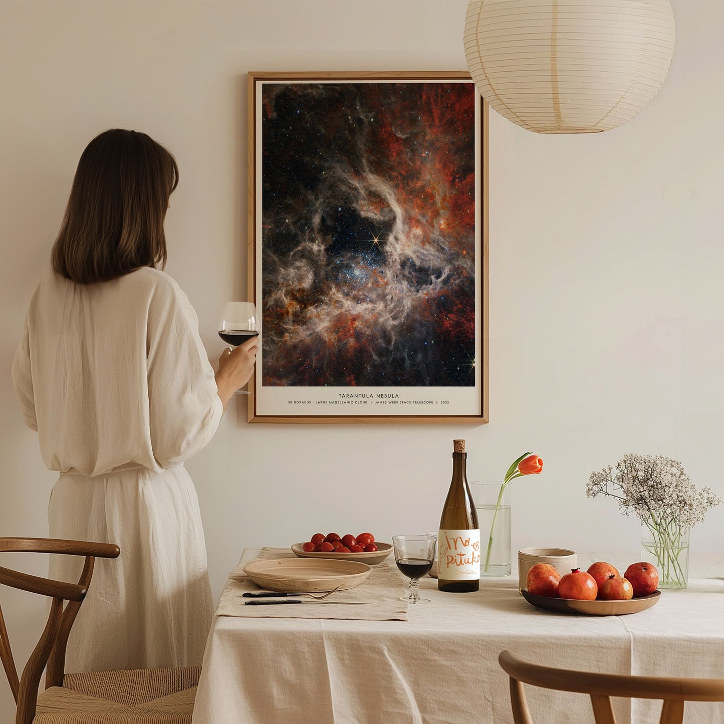 Tarantula Nebula 30 Doradus print illuminated by natural window light in a reading nook