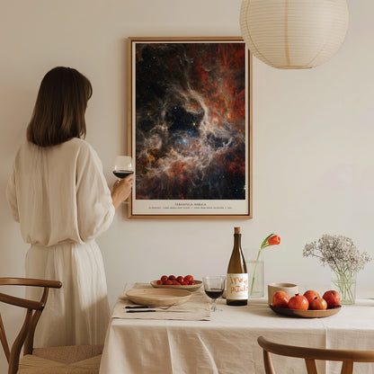 Tarantula Nebula 30 Doradus print illuminated by natural window light in a reading nook