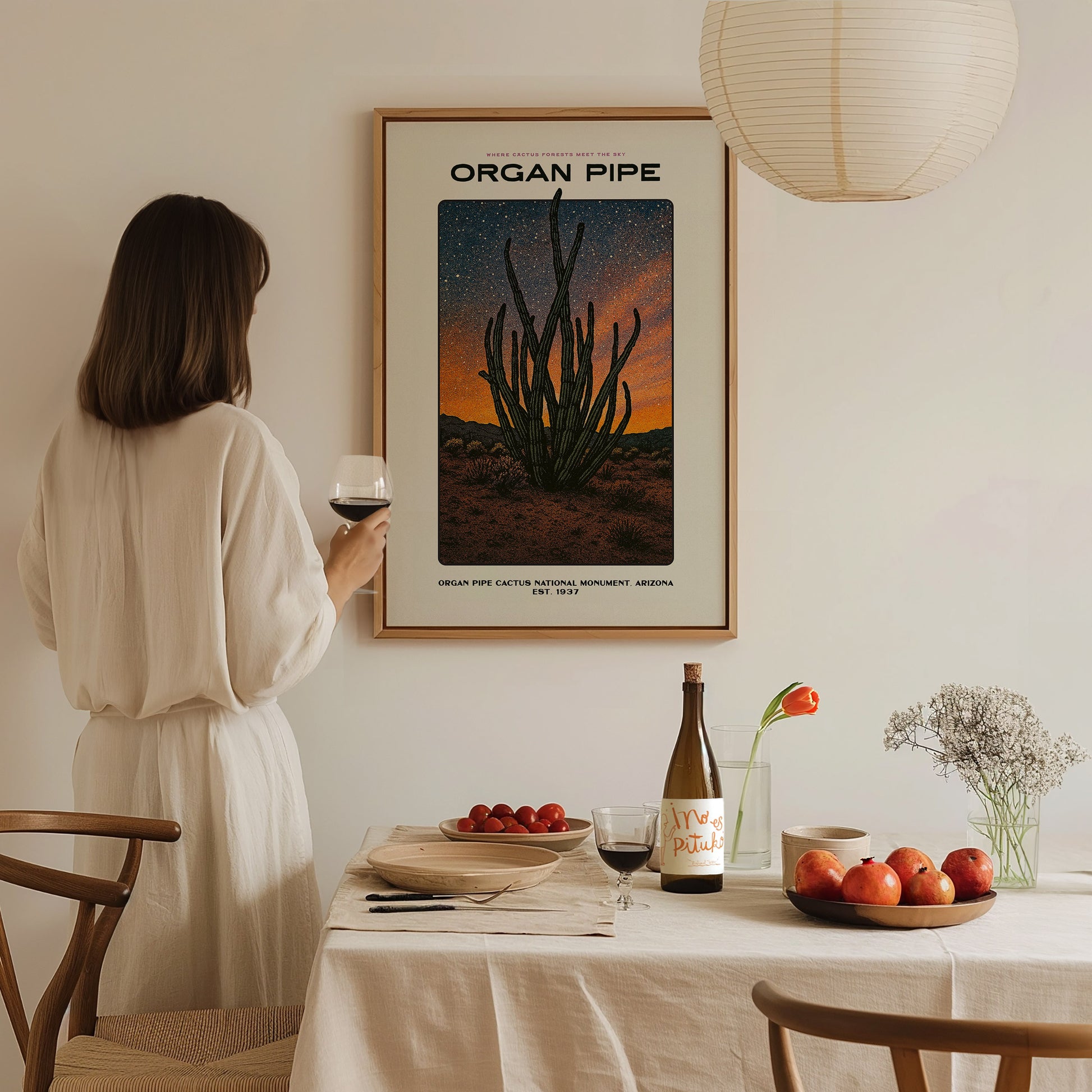 Large Organ Pipe Cactus poster displayed in a living room with soft ambient lighting and desert vintage styling