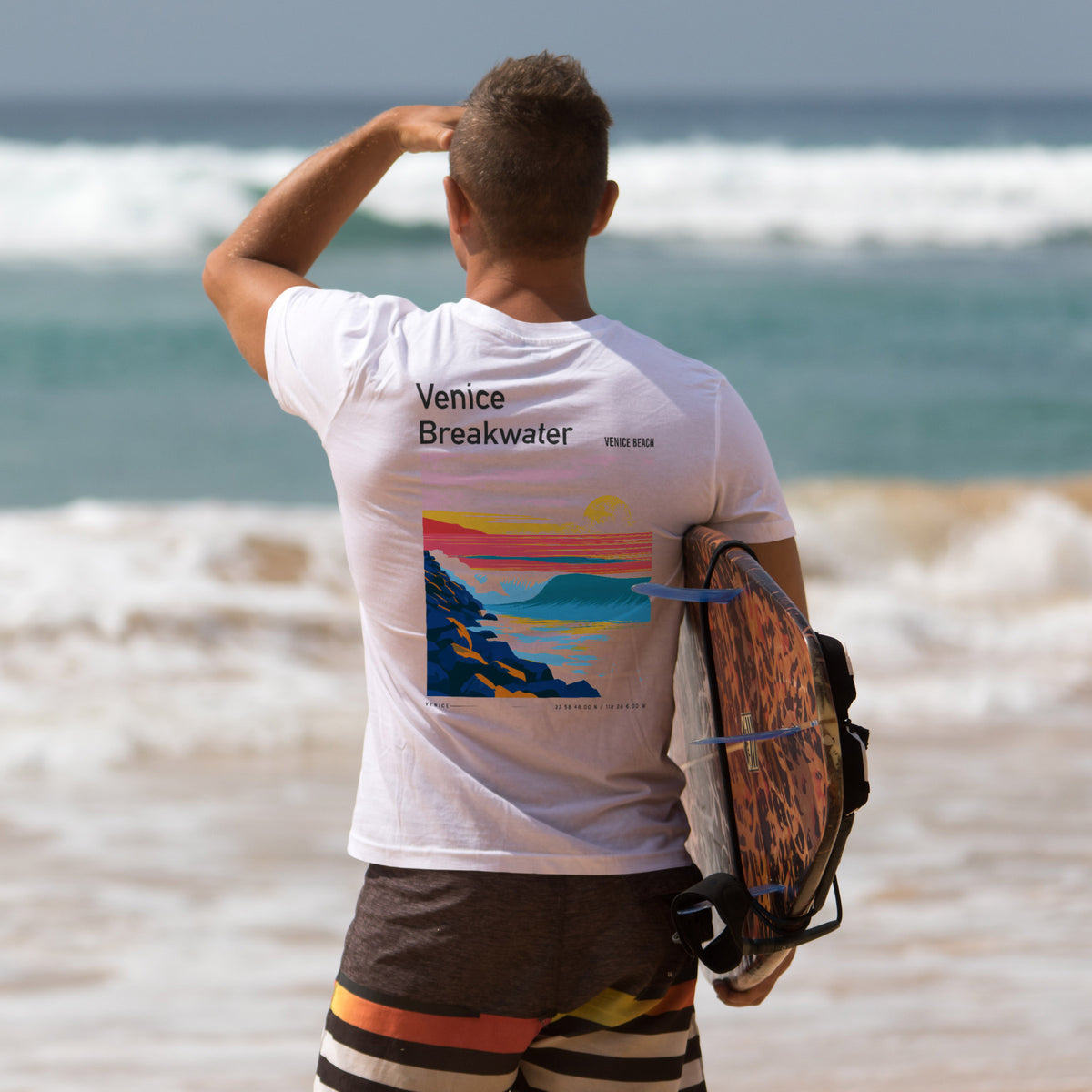 Venice Breakwater Surf T-Shirt | Laid-Back LA Wave Art — design printed on the back of the t-shirt